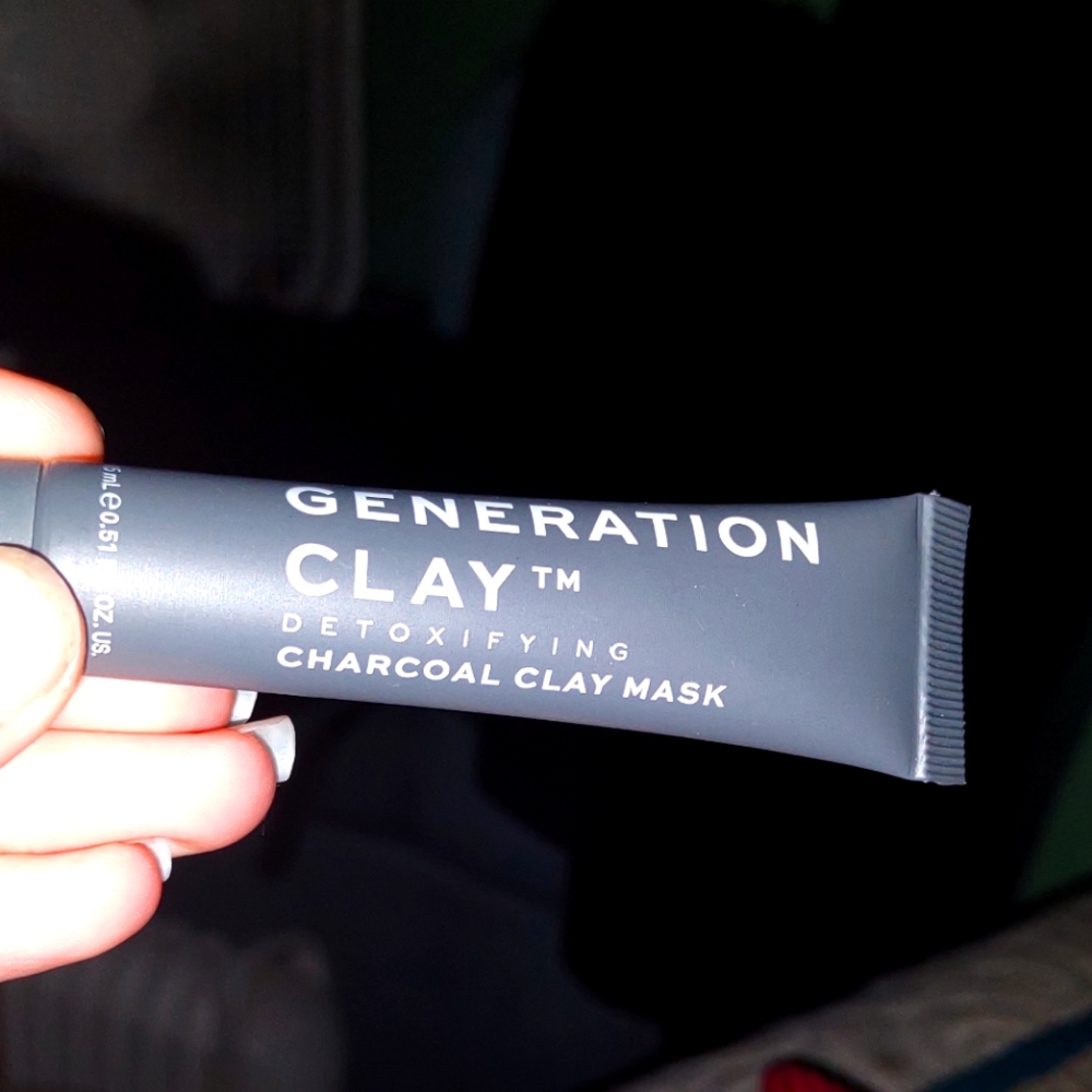 Small tube of charcoal face product